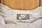 Vintage 1990s Nike Emergency Room Graphic Print Souvenir Basketball T-Shirt Men's L