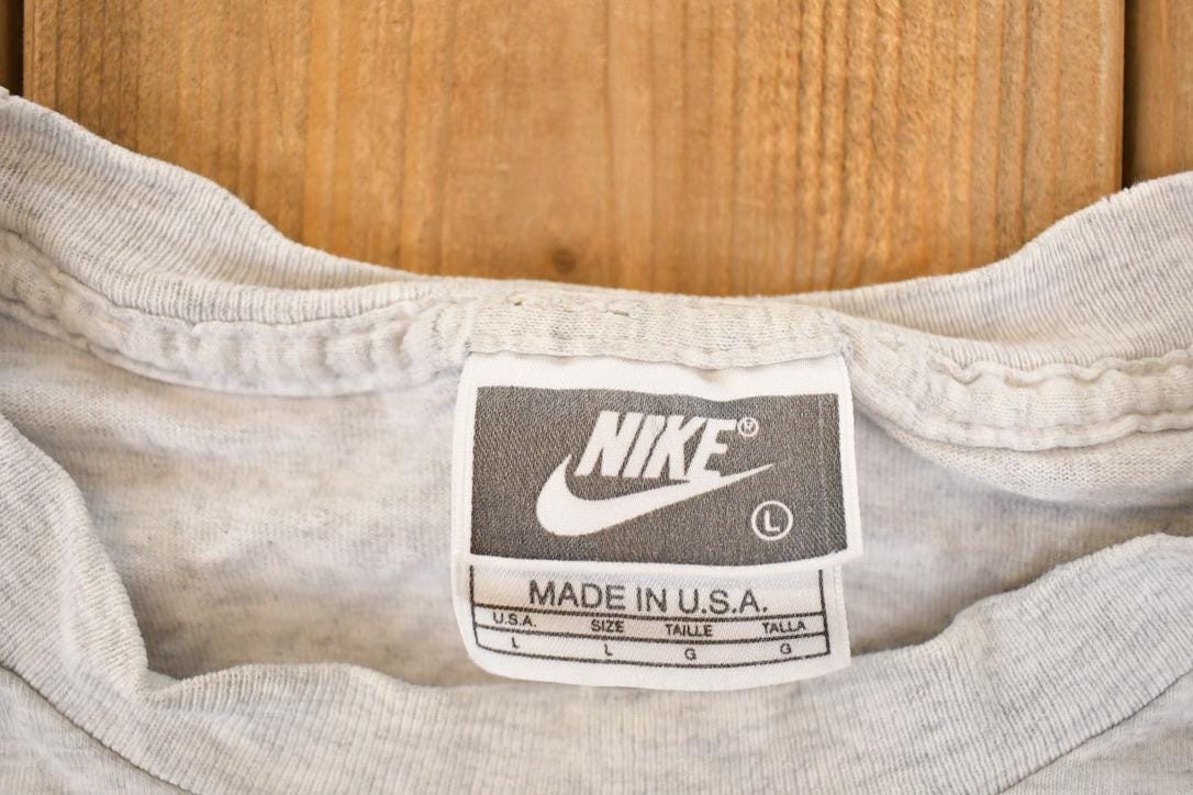 Vintage 1990s Nike Emergency Room Graphic Print Souvenir Basketball T-Shirt Men's L