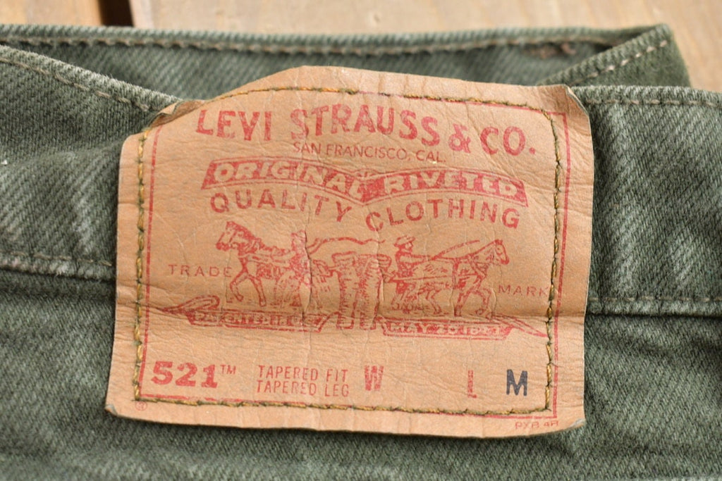 Vintage 1990s 521 Levi's Red Tab Jeans Size 26 x 30