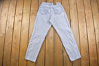 Vintage 1990s Lee Lee Riveted Light Wash Denim Jeans Size 28 x 30