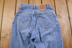 Vintage 1990s Levi's 550 Red Tab Jeans Size 26 x 33