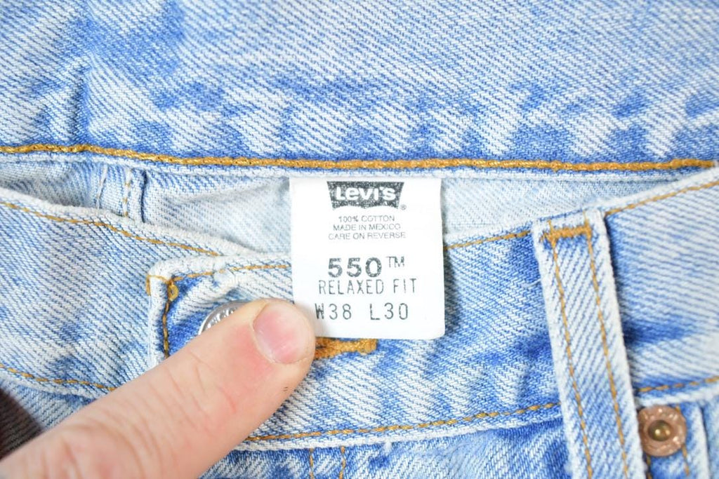 Vintage 1990s Levi Strauss Red Tab 550 Denim Jeans Size 38 x 30 Made In USA