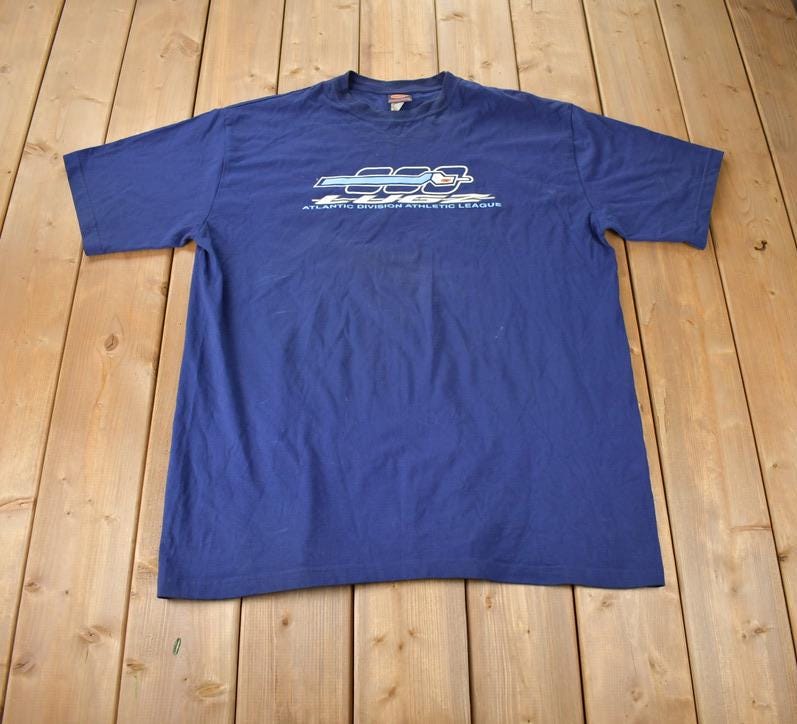 Vintage 1990s Lugz Athletic League Graphic T Shirt Made In USA
