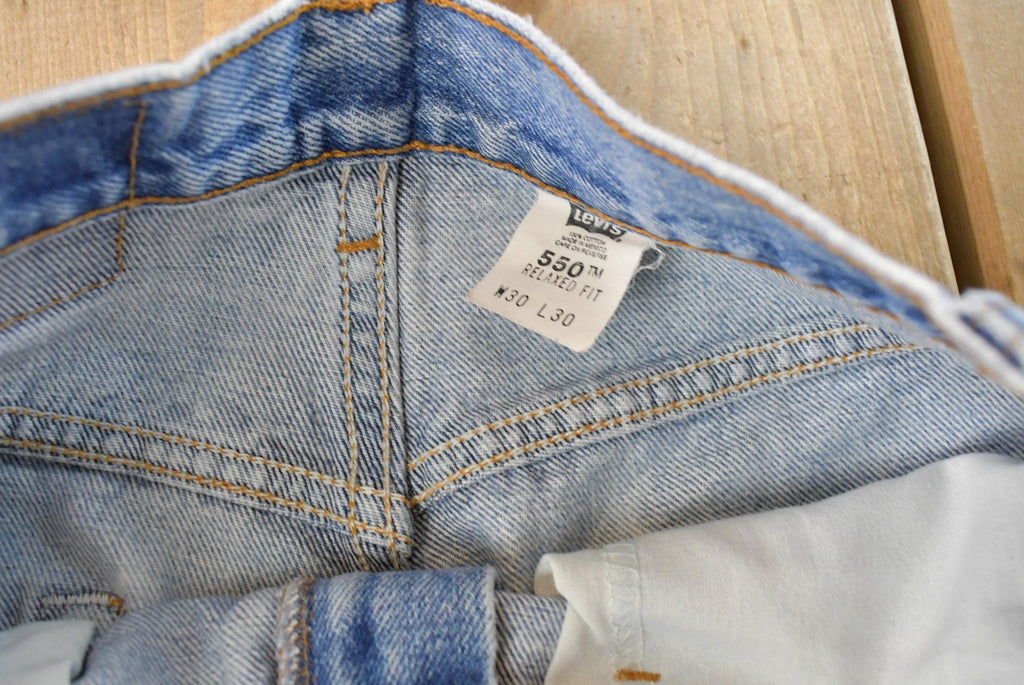 Vintage 1990s Levi's 550 Relaxed Fit Distressed Denim Jeans Men's 28 x 29 / 90s Levi's / Streetwear