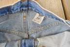 Vintage 1990s Levi's 550 Relaxed Fit Distressed Denim Jeans Men's 28 x 29 / 90s Levi's / Streetwear