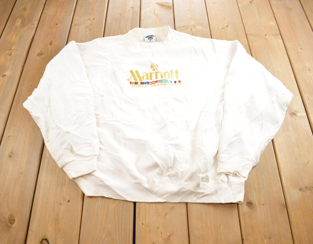 Vintage 1990s Marriott World Class Team Embroidered Crewneck Sweatshirt Made In USA