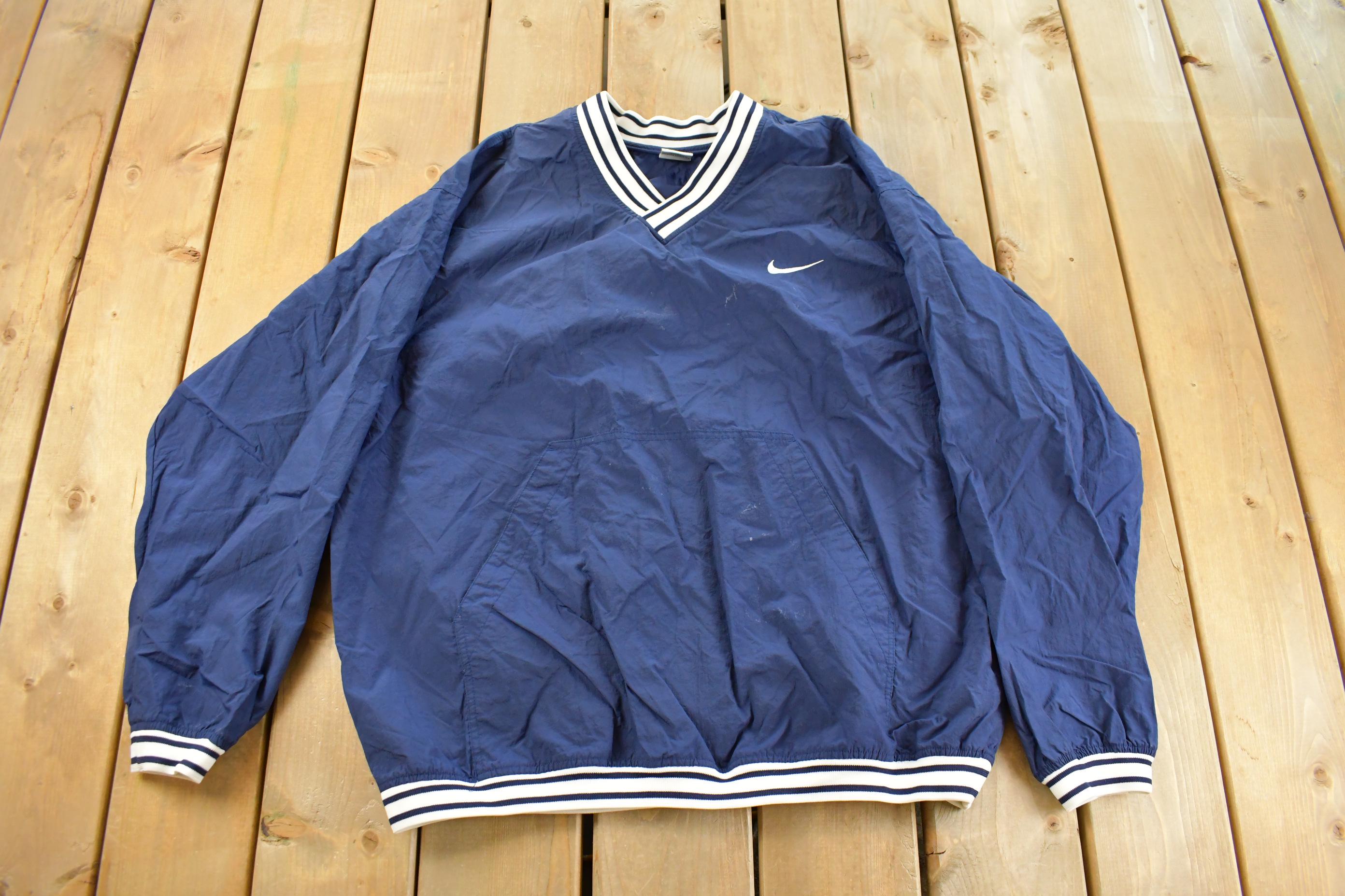Vintage 1990s Nike Embroidered Mini Swoosh Pullover Windbreaker Men's XL
