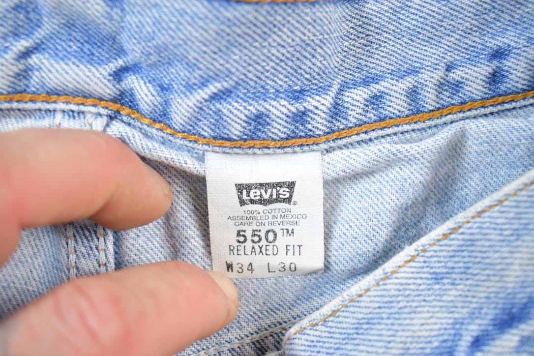 Vintage 1990s Levi Strauss Red Tab 550 Denim Jeans Size 34 x 30 Made In USA
