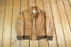 Vintage 1990s New Order Genuine Leather Flight Jacket Youth Medium / Leather Jacket / Military Jacket