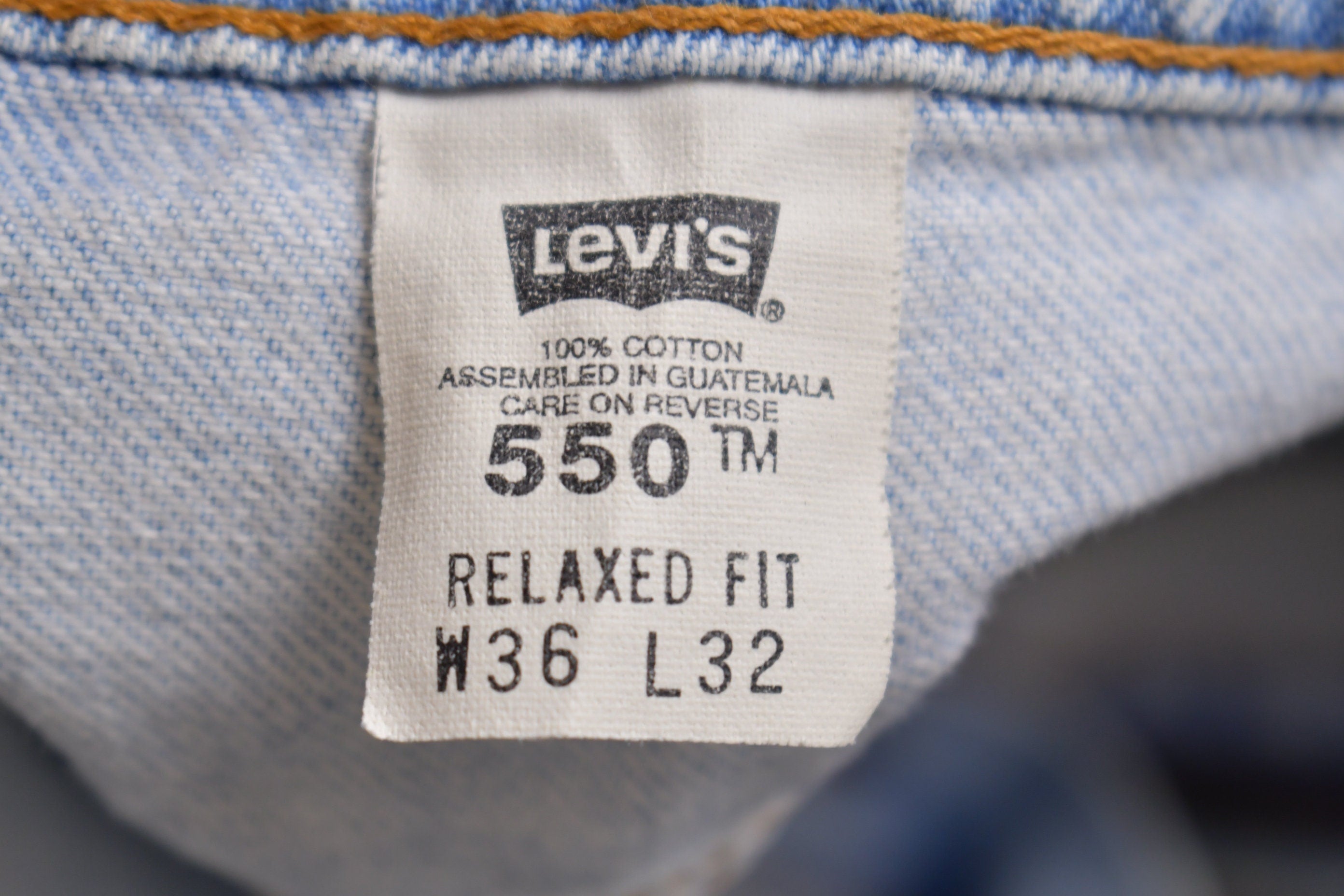 Vintage 1990s Levi's 550 Red Tab Jeans Size 34 x 31