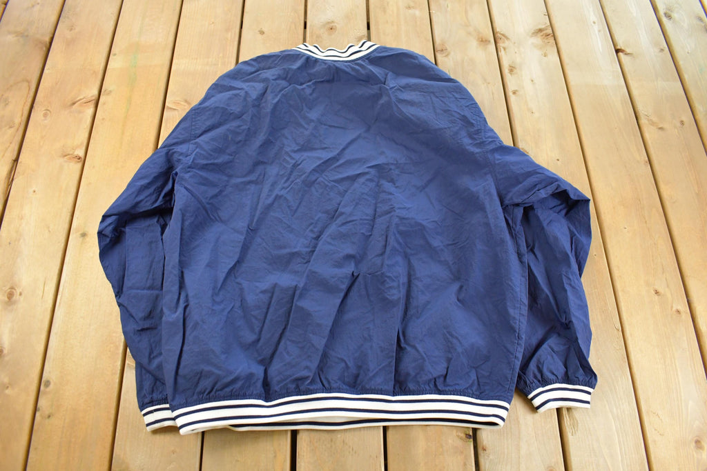 Vintage 1990s Nike Embroidered Mini Swoosh Pullover Windbreaker Men's XL