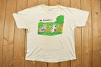 Vintage 1990s A Heard Of Laughter Graphic T Shirt