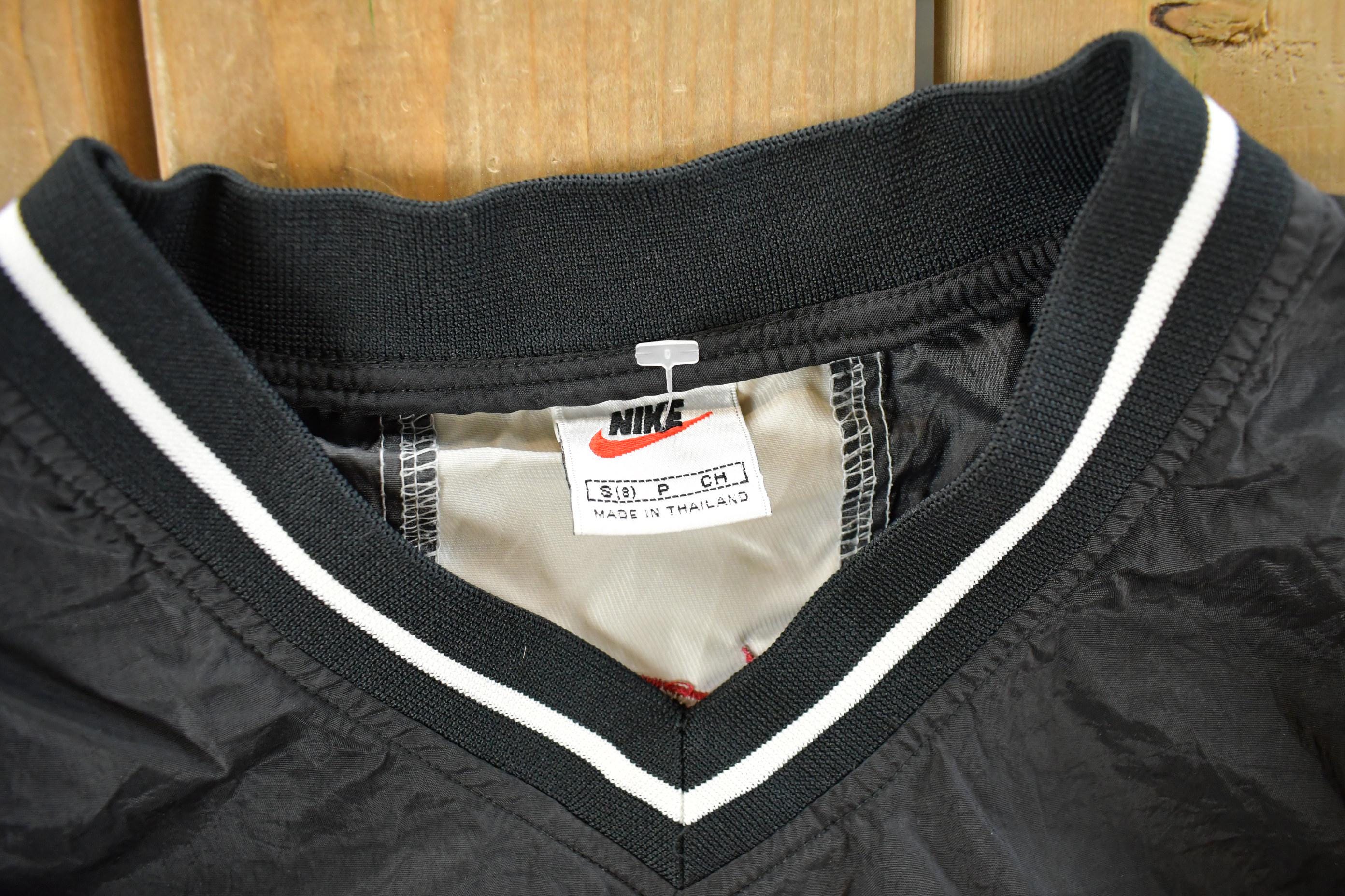 Vintage 1990s Nike Embroidered Mini Swoosh Pullover Windbreaker Youth Small