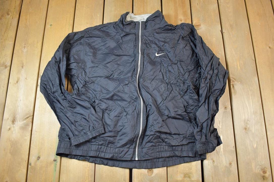 Vintage 1990s Nike Hidden Pocket Windbreaker Jacket