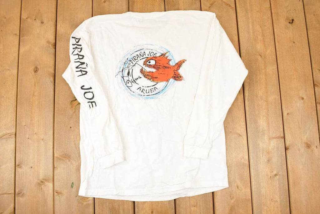 Vintage 1990s Pirana Joe Aruba Sleeve Text Graphic Print Long Sleeve T Shirt Mens L