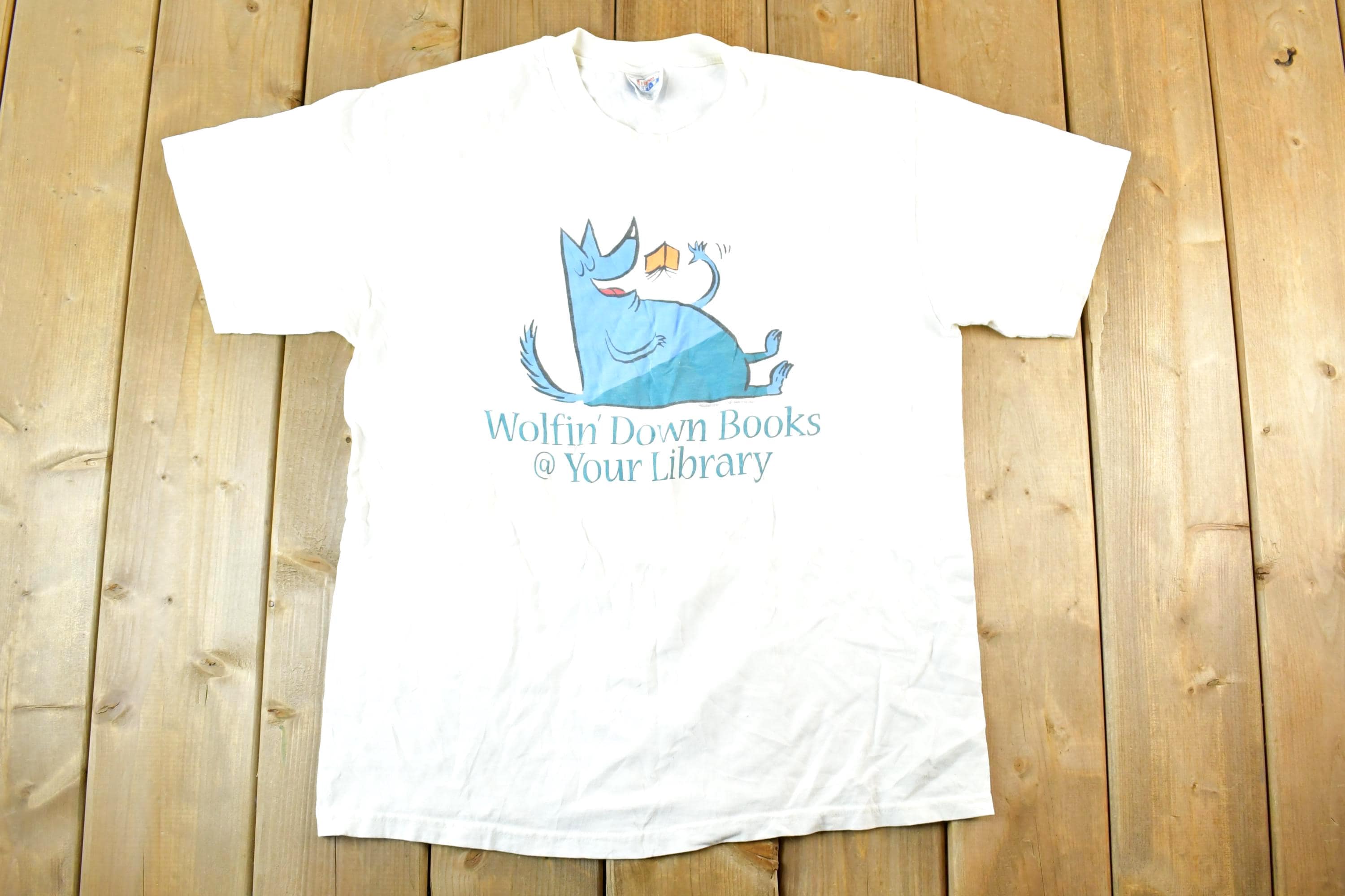 Vintage 1990s Wolfin Down Books At Your Library Souvenir T-Shirt Mens L