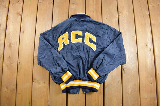 Vintage 1980s Champion RCC Windbreaker Jacket / Team Logo / Athletic Spring Summer Sportswear / Streetwear / Athleisure / Made In USA