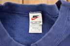 Vintage 1990s Nike Embroidered Mini Swoosh Blue Crewneck Sweatshirt