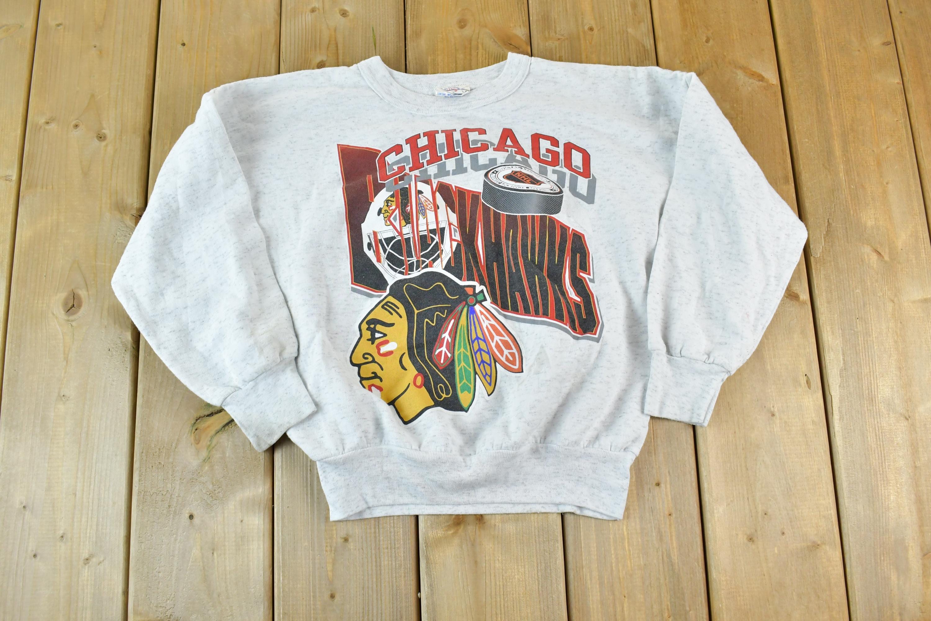Vintage 1990s Chicago Blackhawks Youth NHL Graphic Sweater