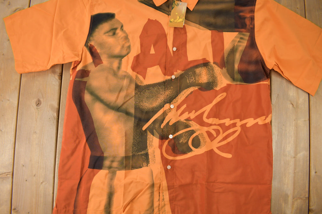 Vintage 1990s Deadstock Platinum Fubu Muhammad Ali All Over Print Button Up Shirt