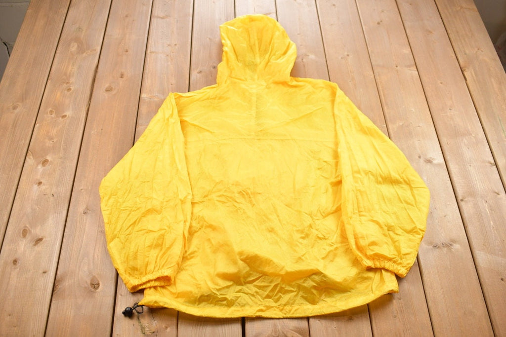 Vintage 1990s Yellow Starter Windbreaker Jacket