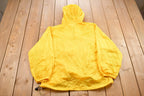 Vintage 1990s Yellow Starter Windbreaker Jacket