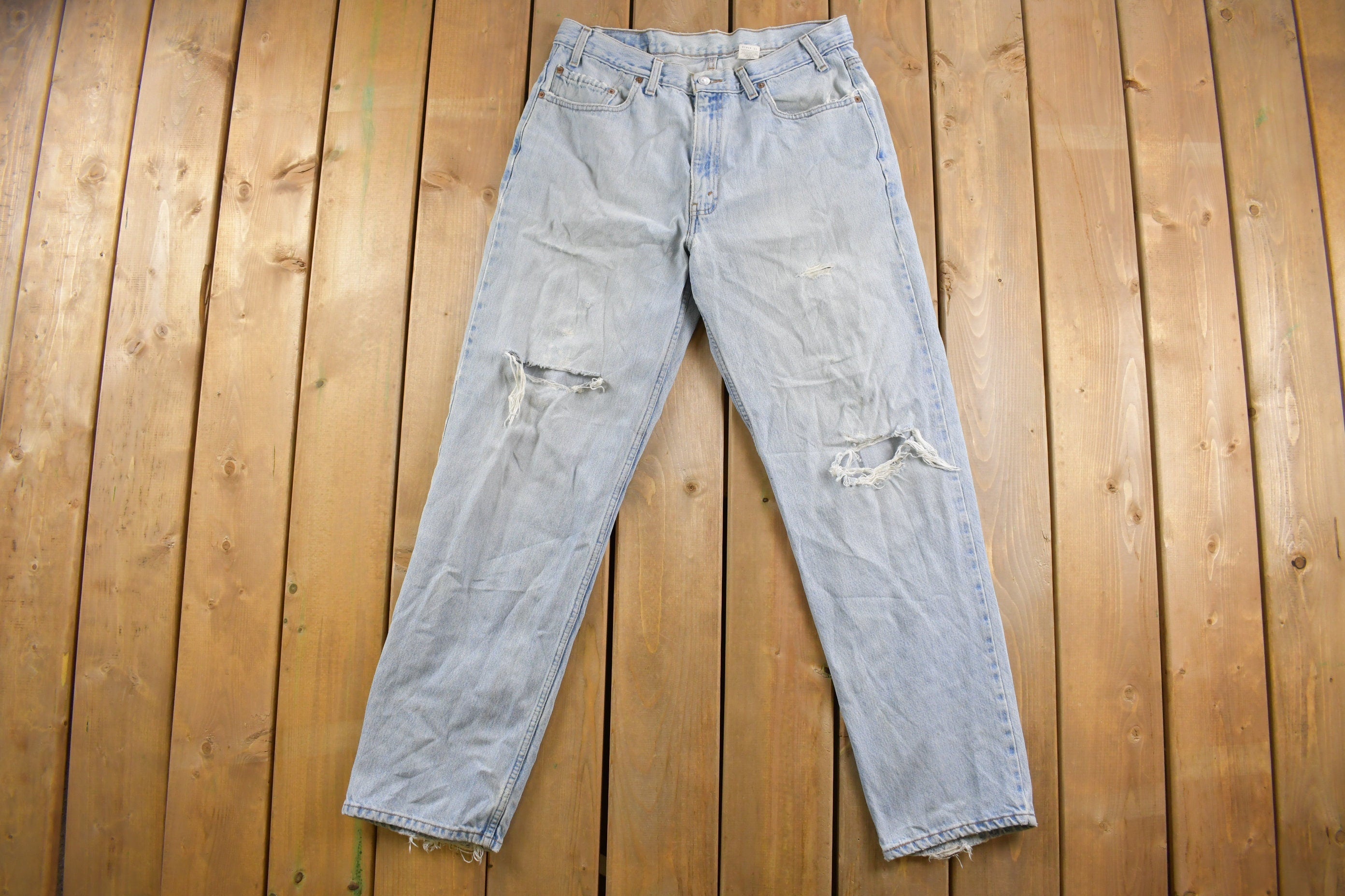 Vintage 1990s Levi's 550 Red Tab Ripped Denim Jeans Size 32 x 31