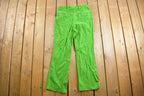 Vintage 1970s Neon Green Flared Trousers Size 32 x 29