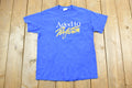 Vintage 1990s Aged To Perfection Peacock Papers Boston Graphic T-Shirt