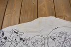 Vintage 1990s Universal Studios All Over Print Graphic T-Shirt