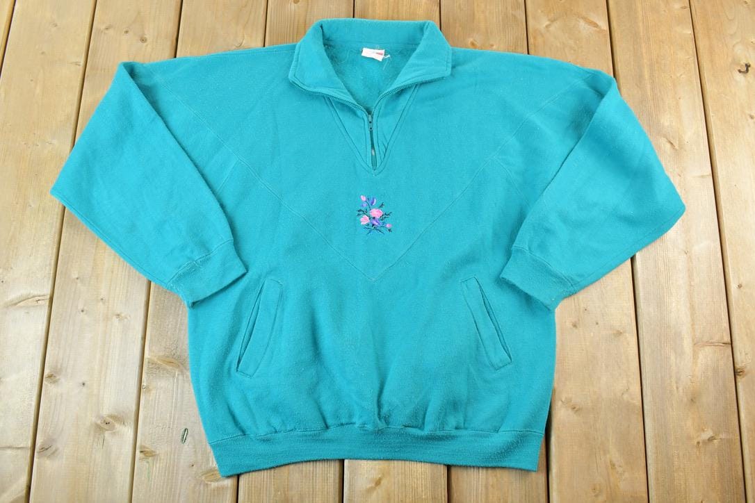 Vintage 1990s Lady Foot Locker Floral Quarter Zip Souvenir Crewneck Sweatshirt