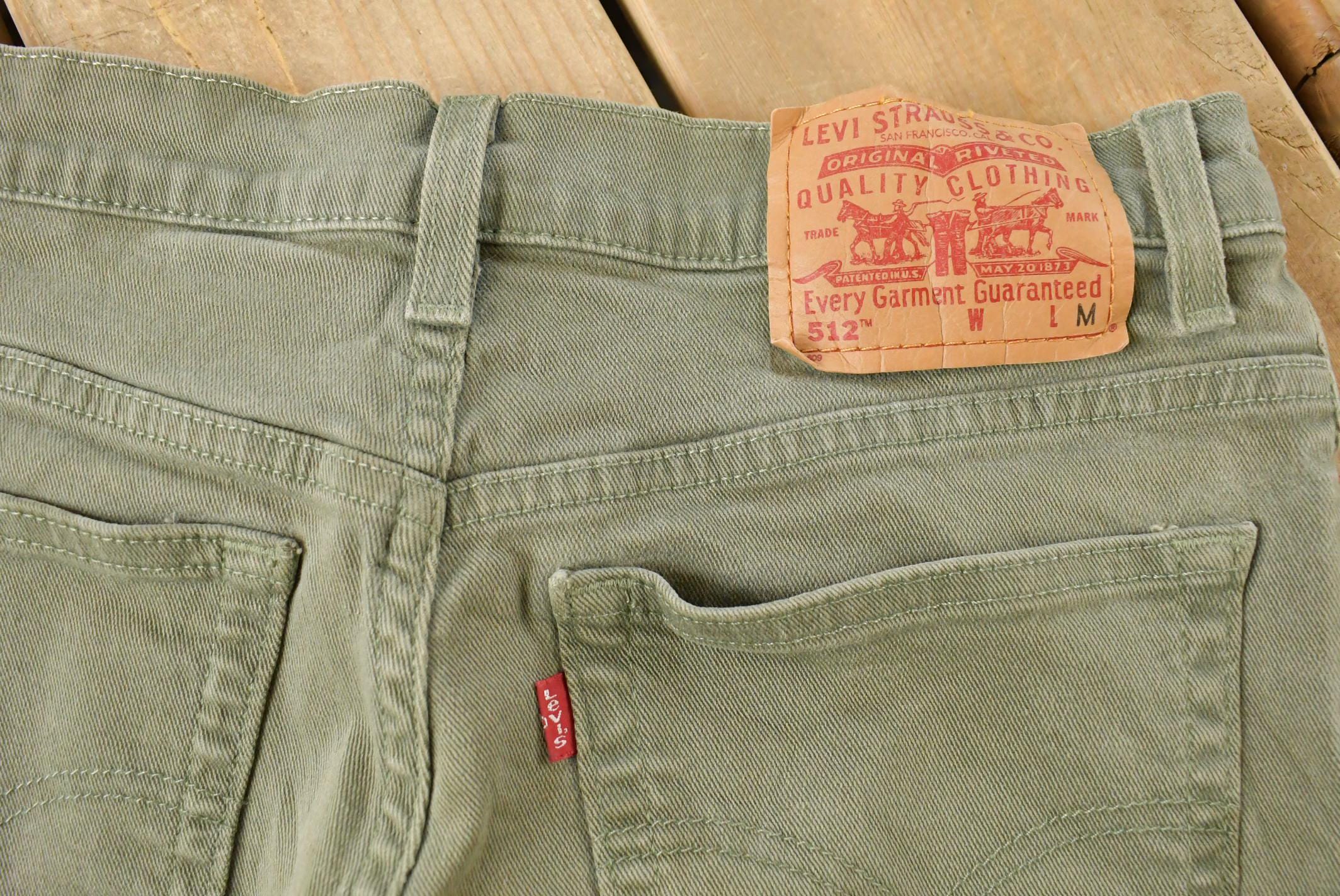 Vintage 1990s Levi's 512 Slim Tapered Denim Jeans Women's 28 x 29 / 90s Levi's / Distressed Sun Faded Jeans