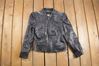 Vintage 1990s Bermans Leather Jacket /