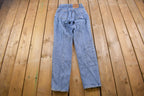 Vintage 1990s Levi's 550 Red Tab Jeans Size 26 x 33