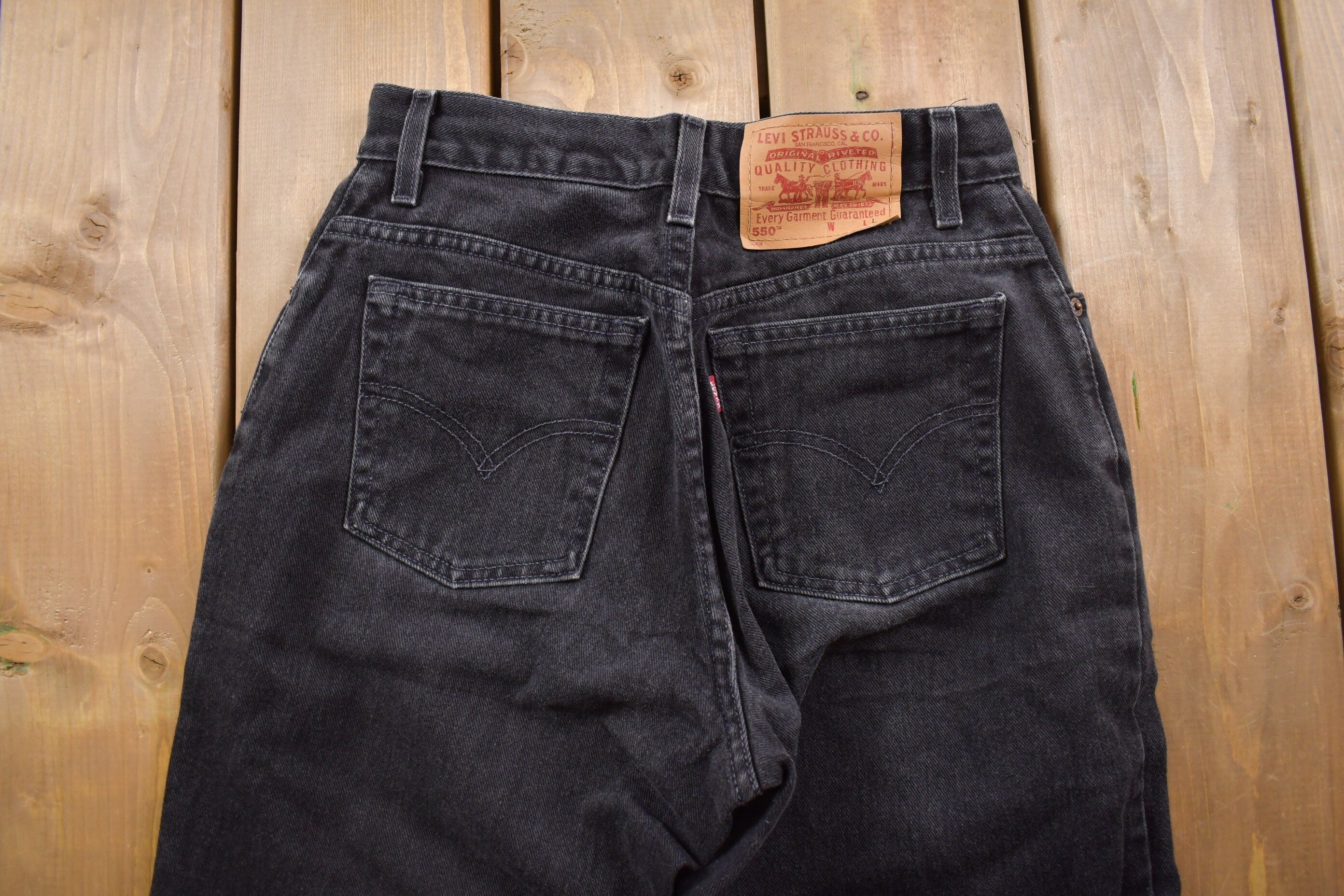 Vintage 1990s Levi's 550 Red Tab Black Jeans Size 26 x 30