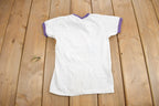 Vintage 1980s Agawa Canada Graphic Ringer T Shirt