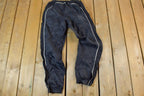 Vintage 1990s Nike Mini Swoosh Splash Pants Size M