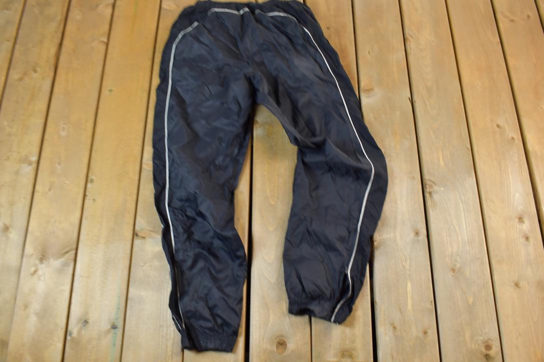 Vintage 1990s Nike Mini Swoosh Splash Pants Size M