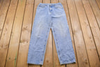 Vintage 1990s Lee Light Wash Blue Denim 28 x 29 / Vintage Jeans / Women's Vintage Jeans / Streetwear Fashion / Made in USA / Vintage Pants