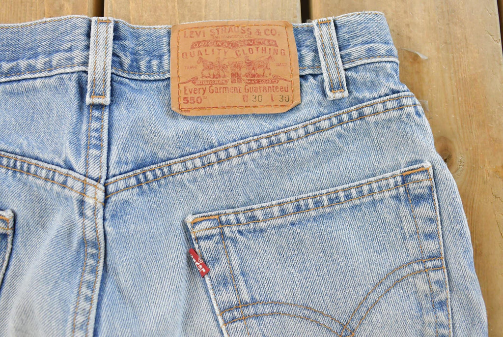 Vintage 1990s Levi's 550 Relaxed Fit Distressed Denim Jeans Men's 28 x 29 / 90s Levi's / Streetwear