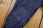 Vintage 1990s Nike Mini Swoosh Track Pants Size XL