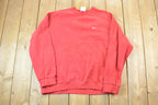 Vintage 1990s Red Nike Embroidered Mini Swoosh Crewneck Sweatshirt