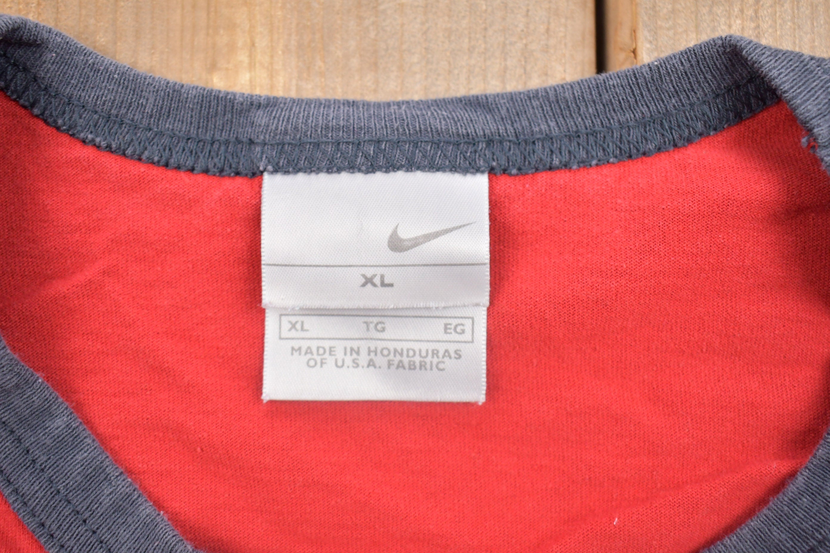 Vintage 1990s Nike Small Logo Graphic Ribbed Neck T Shirt