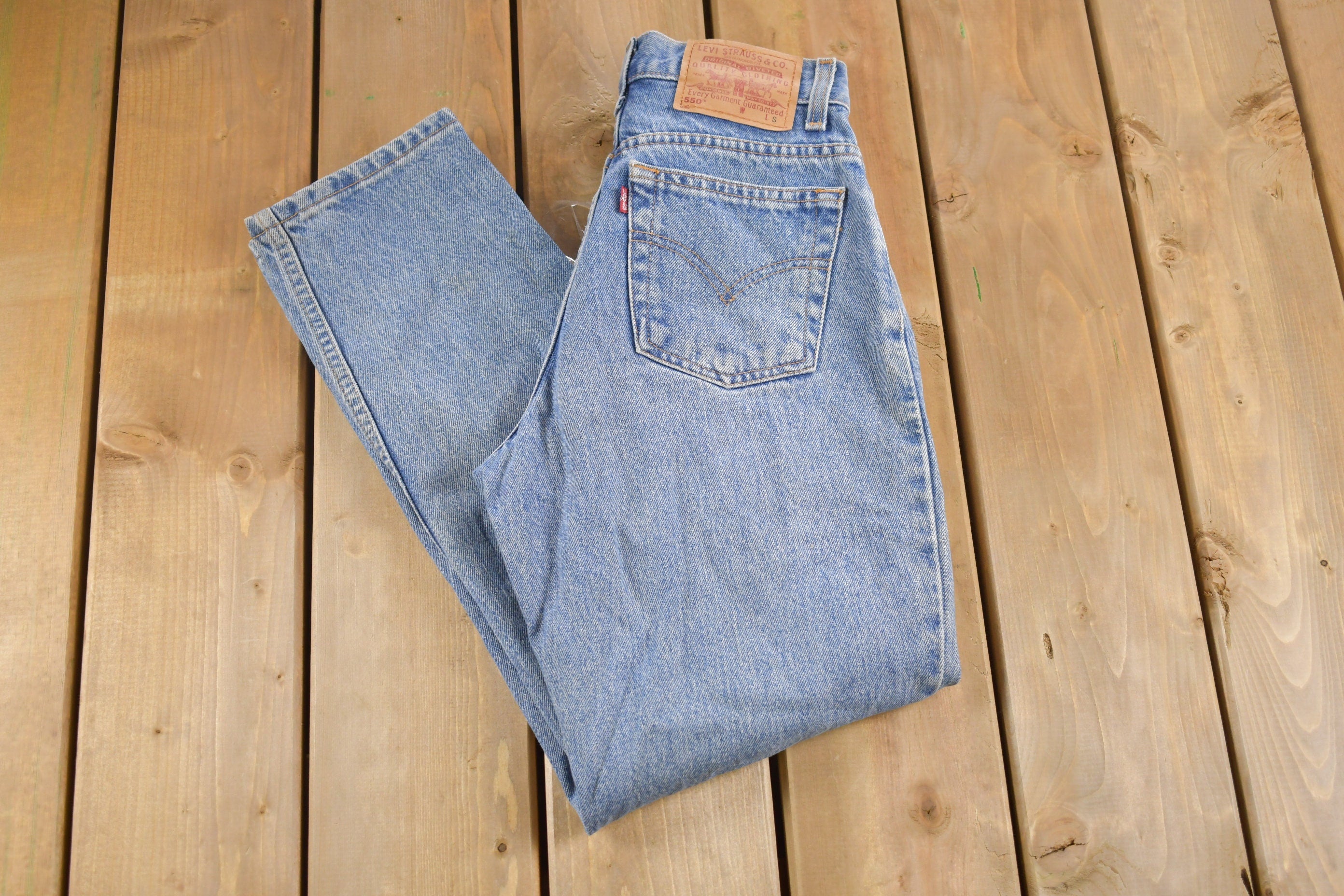 Vintage 1990s Levi's 550 Red Tab Denim Jeans Size 26 x 28