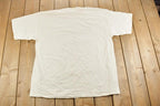Vintage 1990s Real Men Real God Souvenir T-Shirt