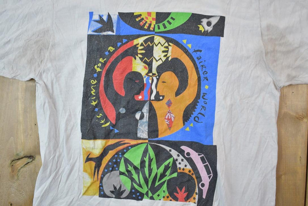 Vintage 1990s Oxfam Canada Gym Master Graphic T-Shirt