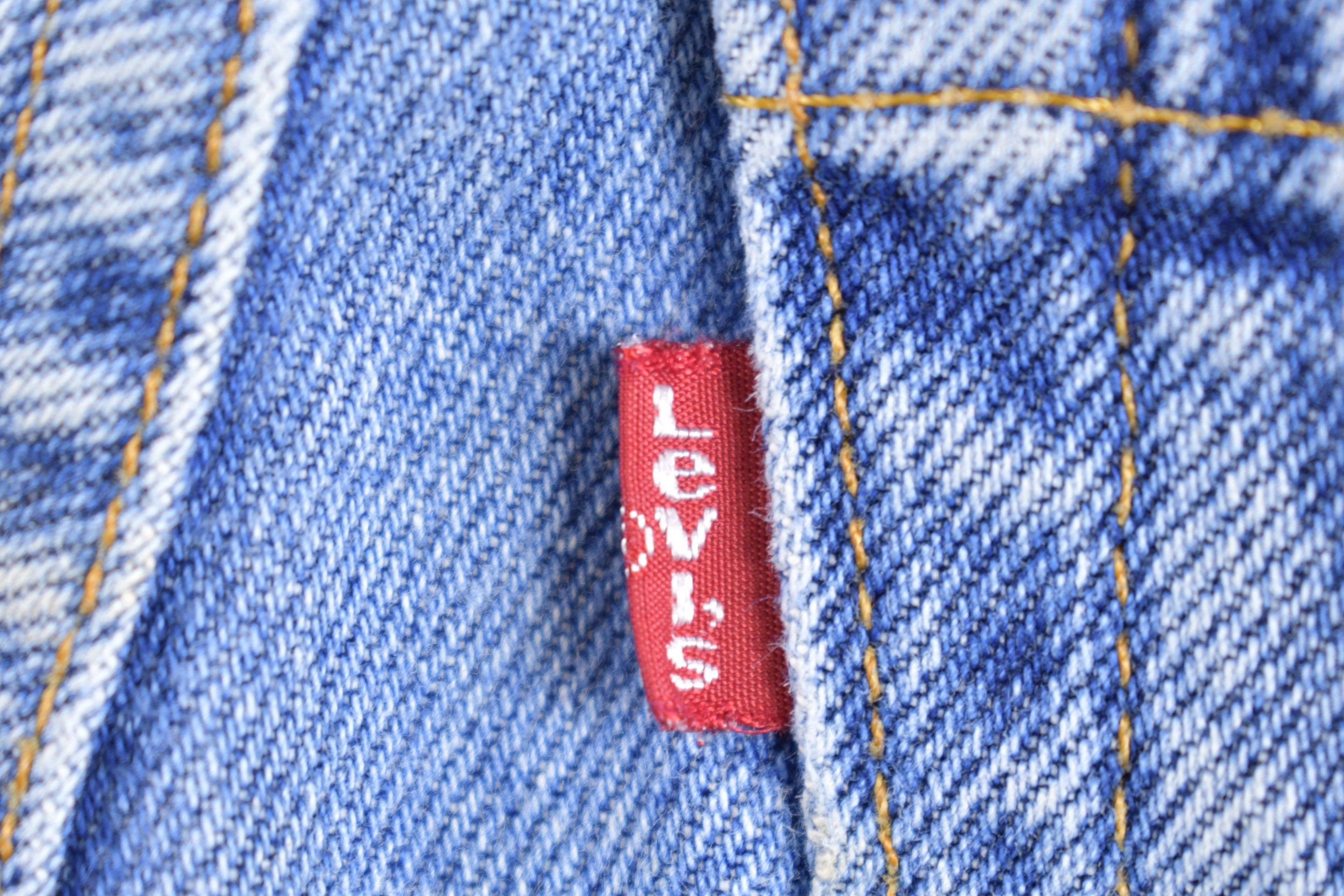 Vintage 1990s Levi's 550 Red Tab Denim Jeans Size 24 x 25