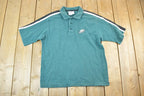 Vintage 1990s Philadelphia Eagles NFL Graphic Polo Style T-Shirt Made In USA