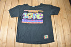 Vintage 1990s Cross Colours Money Can't Buy You Love Graphic T Shirt Made In USA