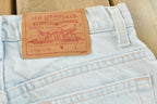 Vintage 1990s Levi's 550 Relaxed Fit Denim Light Wash Blue Jeans Size 26 x 30 / 90s Levi's / Made in USA / Streetwear